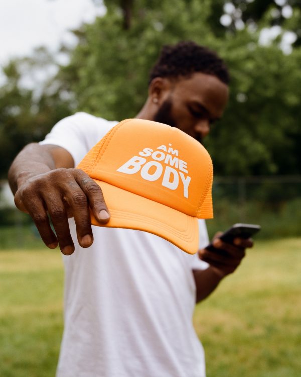 <p style="color:rgb(255 165 0);"> “The Orange Hat”</p>