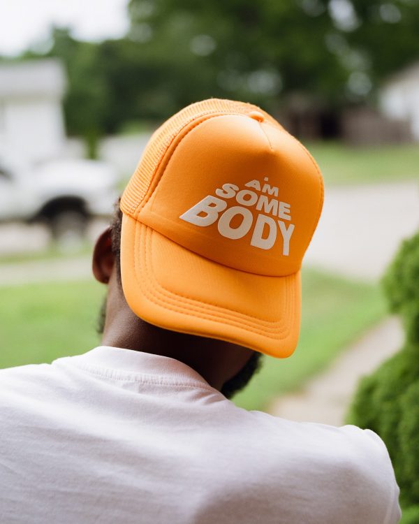<p style="color:rgb(255 165 0);"> “The Orange Hat”</p> - Image 2